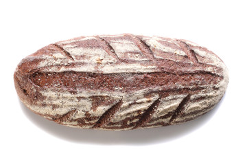 loaf of rye bread on a white background