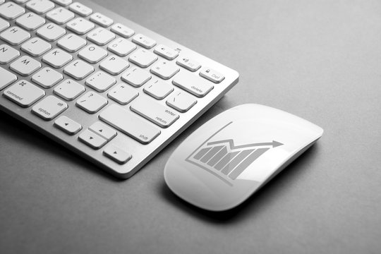 Business e-commerce icon on mouse & computer keyboard