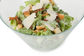 caesar salad on a glass bowl