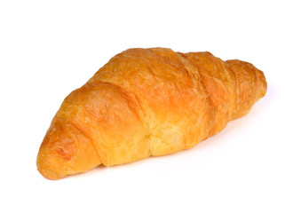 Fresh and tasty croissant over white background