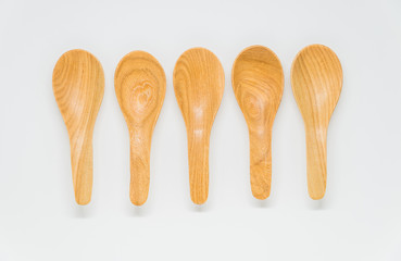 Five Classic wooden spoon on white background and selective focus