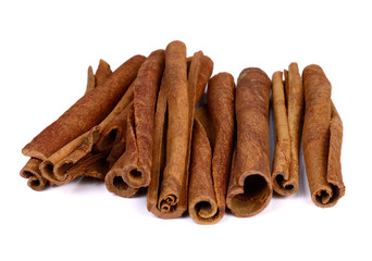 Cinnamon sticks on white background.