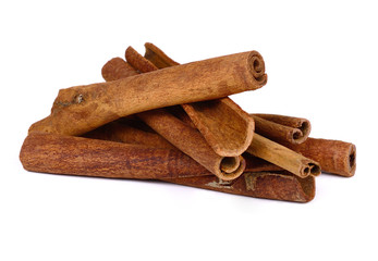 Cinnamon sticks on white background.
