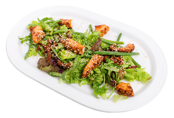 Salad with grilled octopus and dried tomatoes.