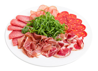 Delicious meat platter with arugula.