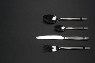 cutlery on dark table