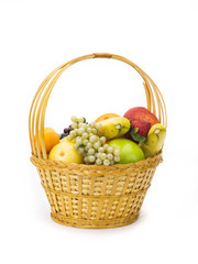 tasty summer fruits in backet isolated on white