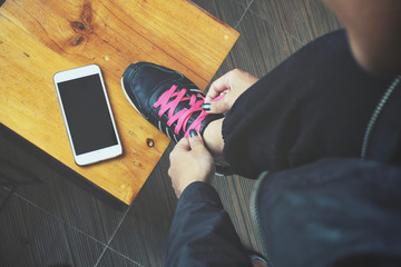 Sport shoes with smart phone