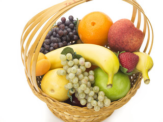tasty summer fruits in backet isolated on white