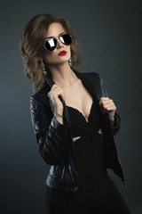 Fashion portrait young beauty woman studio shot on dark bg