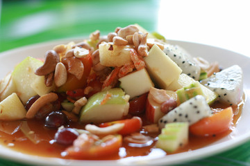 Spicy fruit salad with selective focus