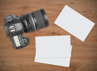 Modern camera and blank photo frames