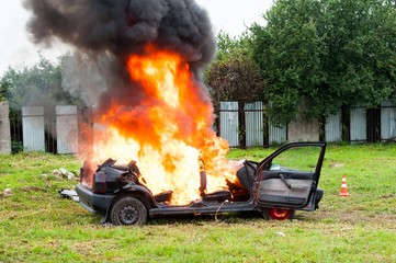 Burning car. Fire suddenly started engulfing all the car