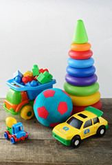 toys collectionon wooden table and white background