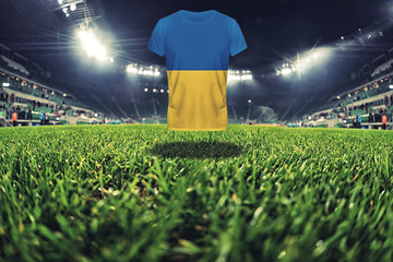 Ukraine national flag on t-shirt on football stadium