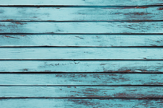 Vintage blue wooden background. Old weathered aquamarine board. Texture. Pattern. Wood background.