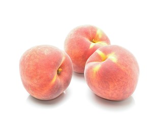 Peach fruit on white background
