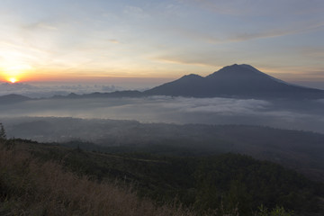 Sunrise above clouds