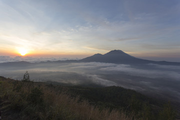 Obraz premium Sunrise above clouds