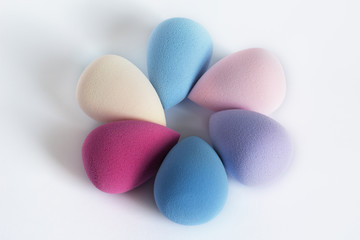 Cosmetic beauty blenders on a white background