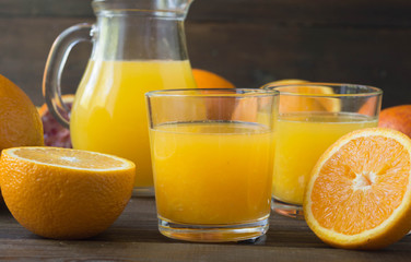 Fototapeta na wymiar Fresh orange juice in a glasses