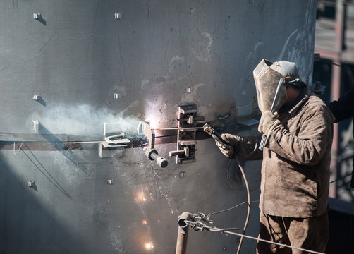 Worker While Doing A Welding Outdoor