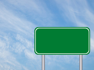 Blank green transportation sign with the blue sky