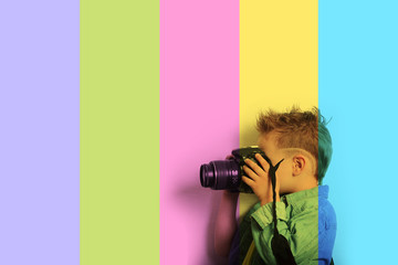 baby boy with camera