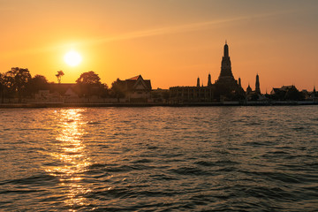 Wat Arun Ratchawararam Ratchawaramahawihan or Wat Arun.