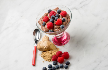 chocolate mousse with blueberry strawberry and ginger
