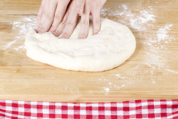 kneading dough using a hand