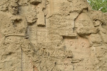 The bas-relief on the walls, the ruins of the monument-ensemble 