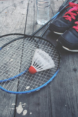 Set sports of sport shoes and badminton racket with water bottle