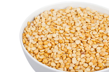 cropped image of yellow lentils in bowl.