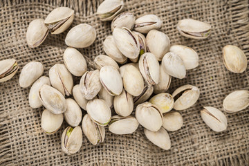 Whole Pistachios on wood