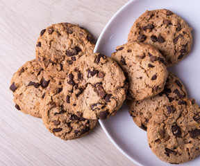 top view of chocolate chip cookies on wooden table
