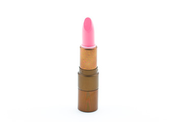 Pink lipstick on white background