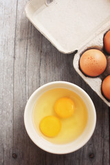 Eggs in box and bowl