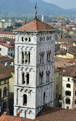 Fototapeta na wymiar San Michele in Foro medieval bell tower in the historic center of Lucca