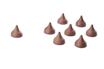 morsels arranged on white.