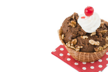 chocolate ice cream with peanuts in cone