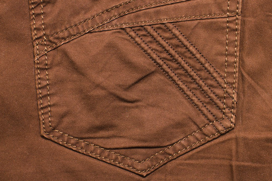 brown jeans back pocket