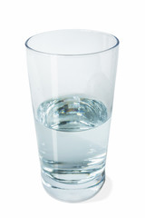 Half full glass of crystal clear water