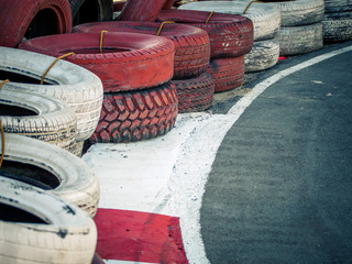 Safety barriers made of old wheels in oudoor carting and racetrak