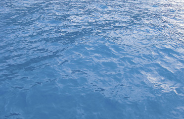 Ripples on a blue surface of the sea.