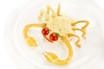 Fototapeta na wymiar salad with cheese and crab meat in the form of a crab
