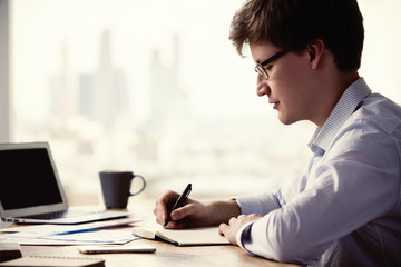 Businessman writing side