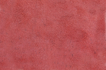 red leatherette texture as background.