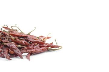 Obraz premium Dry chili pepper isolated on a white background.left
