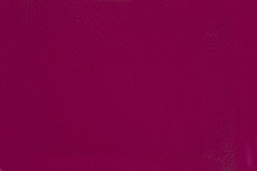 red leatherette texture as background.